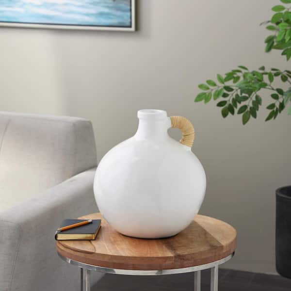Litton Lane 13 in. White Jug Inspired Ceramic Decorative Vase with Rattan Wrapped Handle