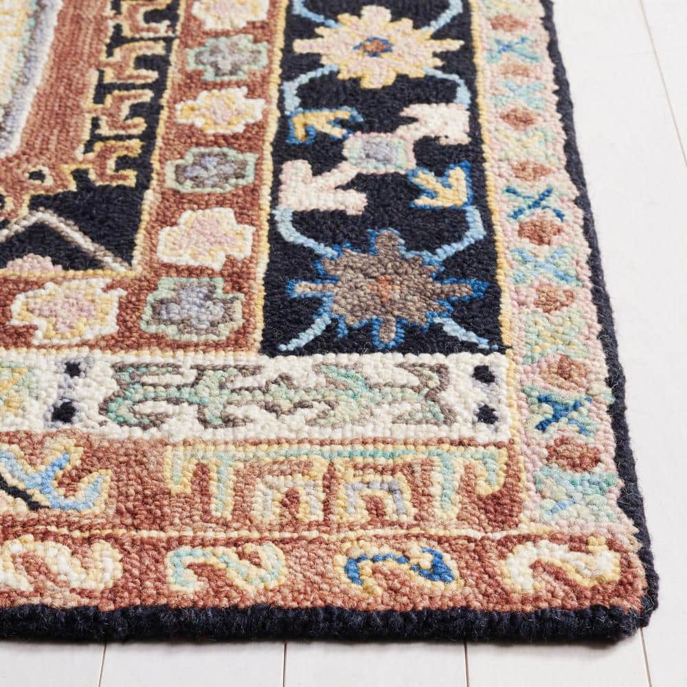 Handmade Black and Ivory Geometric Wool Round Area Rug