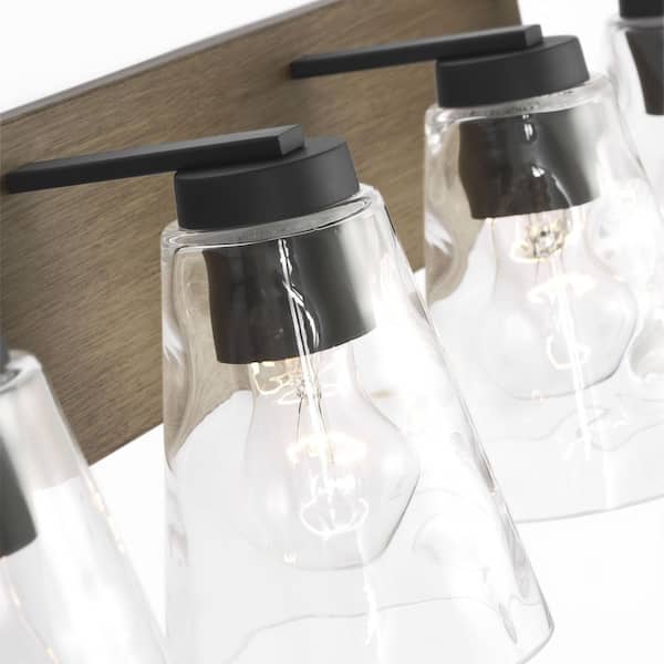 Generation Lighting - Dunton 31 in. W x 7.5 in. H 4-Light Midnight Black Dimmable Bathroom Vanity Light with No Bulbs Included