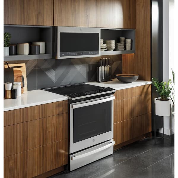 https://images.thdstatic.com/productImages/a87194a7-f6b5-4819-b922-b6548fc3b8c3/svn/fingerprint-resistant-stainless-steel-ge-profile-single-oven-electric-ranges-pss93ypfs-fa_600.jpg