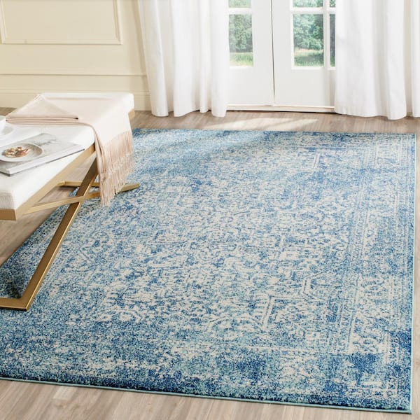 Evoke Blue/Ivory 7 ft. x 9 ft. Distressed Border Medallion Area Rug