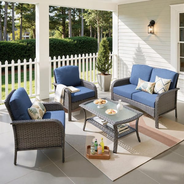 Hyacinth Gray 4-Piece Wicker Patio Outdoor Conversation Seating Set with a Coffee Table and Denim Blue Cushions