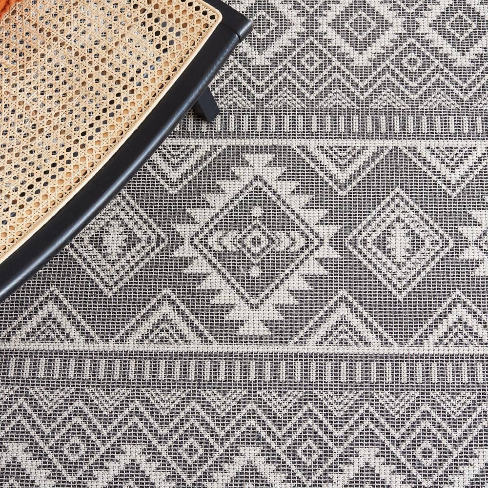 Augustine Black and Ivory Geometric Synthetic Area Rug, 6'4" x 9'6"