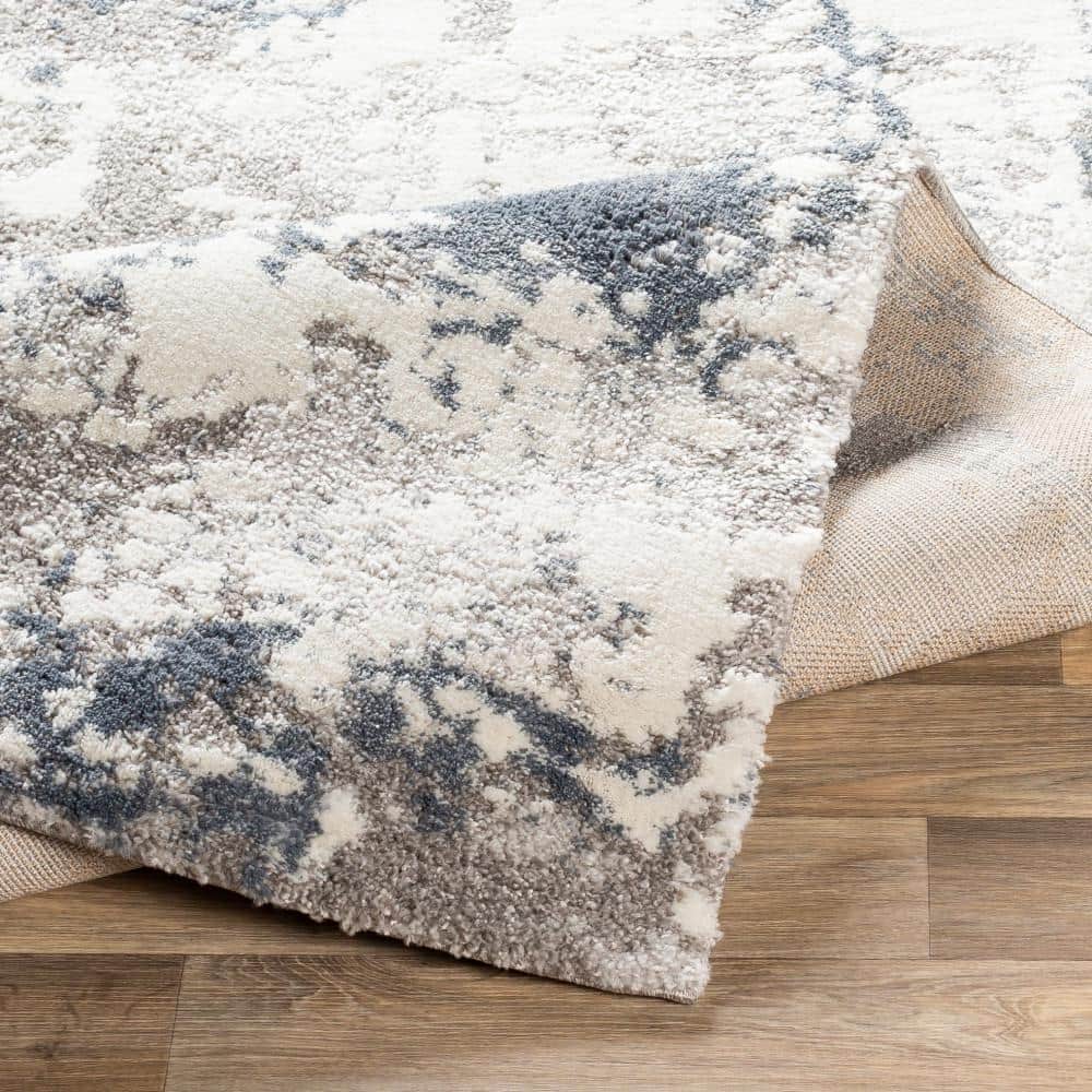 Blue and Beige Abstract 9' x 12' Synthetic Area Rug