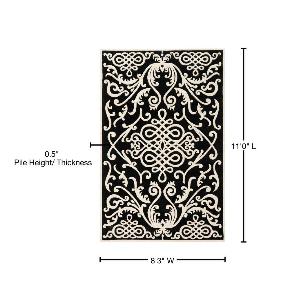 Handmade Black and Ivory Tufted Wool Area Rug, 8'3" x 11'