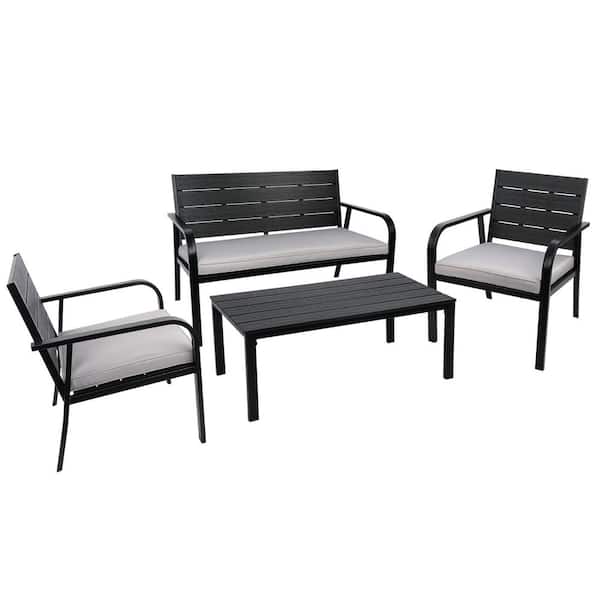 Zeus & Ruta Black 4-Piece Wood Grain Design PE Steel Frame Outdoor Patio Conversation Set with Gray Cushions and Coffee Table