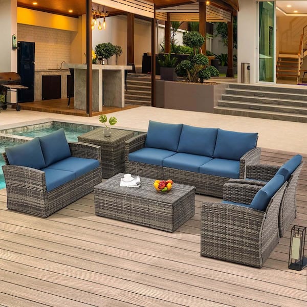 Zeus & Ruta 7-Piece Gray Wicker Outdoor Conversation Set with Dark Blue Cushions and 1-Storage Box