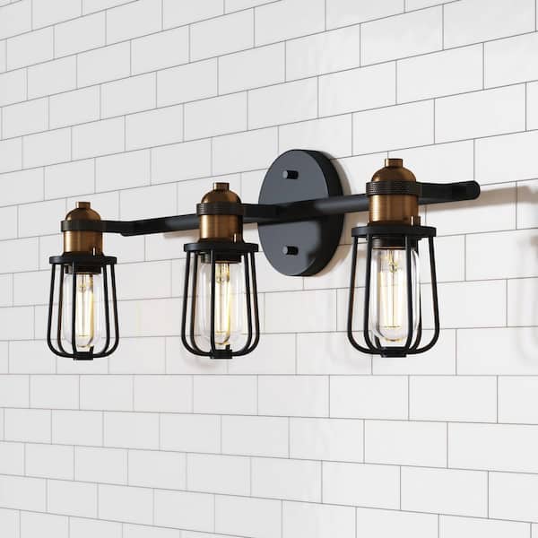Nathan James Rori 23 in. 3-Light Black Vanity Light Indoor Bathroom with Farmhouse Cage Sconce and Brass Details