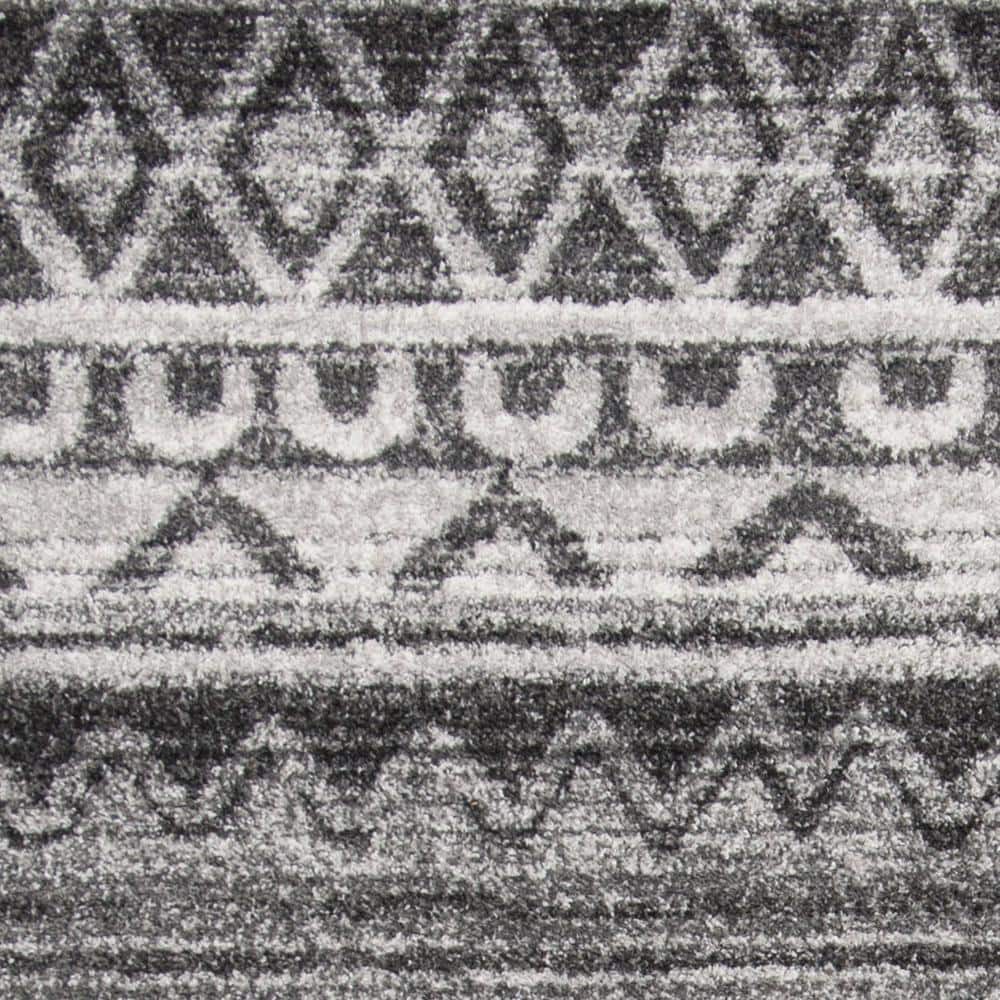 Ivory and Charcoal 6' x 9' Hand-knotted Synthetic Area Rug