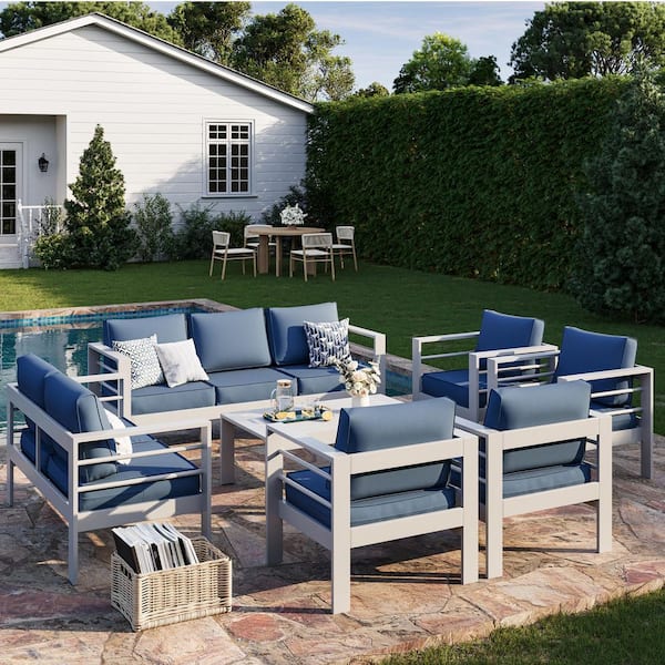 7-Piece White Aluminum Patio Conversation Set with Blue Cushions and Coffee Table