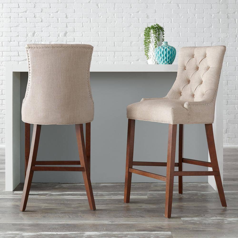 https://images.thdstatic.com/productImages/a9308446-1fb6-4d05-a425-87272d0c2371/svn/biscuit-walnut-stylewell-bar-stools-nutton-h-wb-64_1000.jpg
