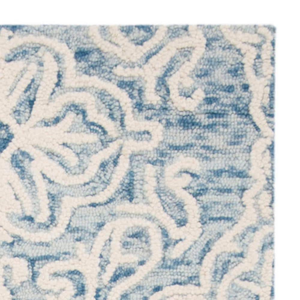 Handmade Tufted Blue/Ivory Floral Wool Area Rug
