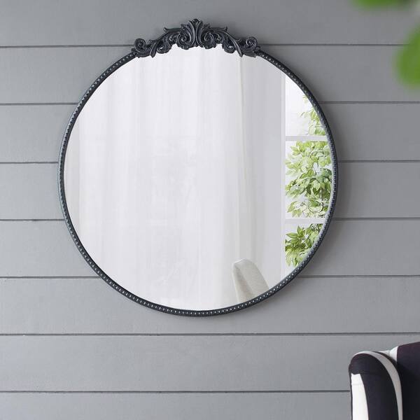 Round Wall Mirror Surrounded by Smaller Round Mirrors Multicolor