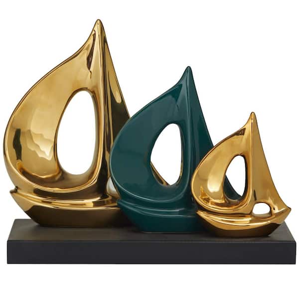 CosmoLiving by Cosmopolitan 5 in. x 10 in. Gold Polystone Sail Boat Sculpture with Black Base