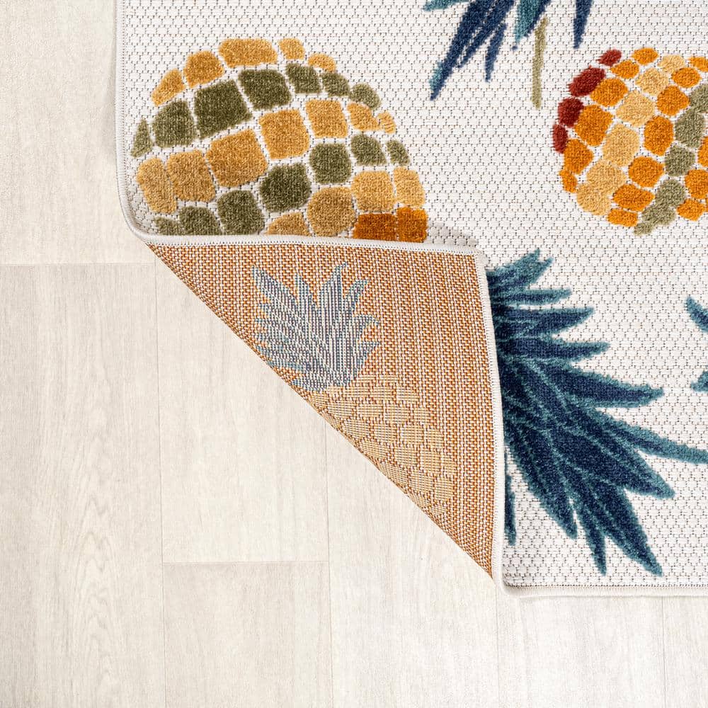4' x 6' Ivory and Orange Floral Synthetic Area Rug