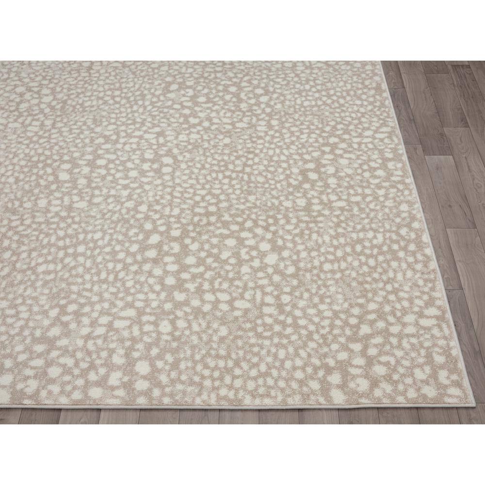 Ivory and Beige Cheetah Print 8' x 10' Synthetic Area Rug