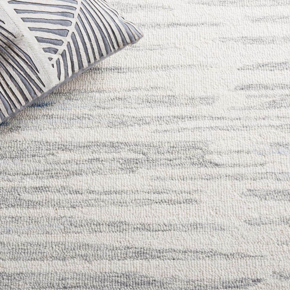Handmade Abstract Ivory and Light Blue Wool Area Rug, 4' x 6'
