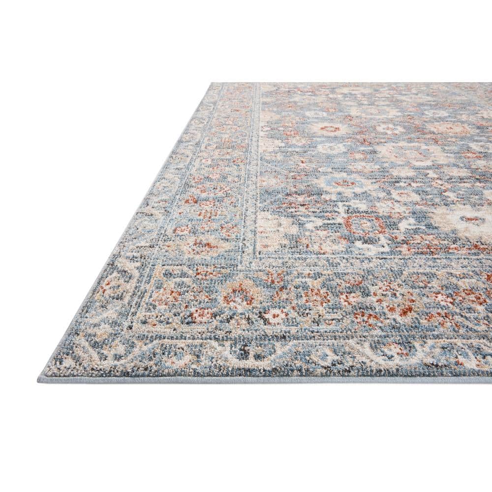 Odette Sky and Rust Synthetic Stain-Resistant Area Rug 5'-3" x 7'-9"