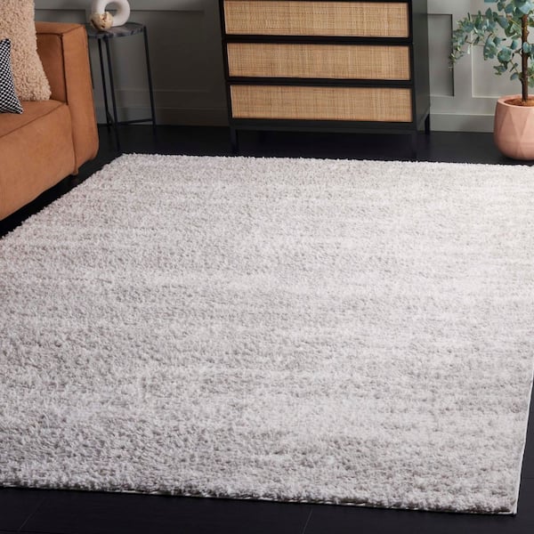 Rumi Shag 8 ft. x 10 ft. Gray/Ivory Distressed Abstract Area Rug