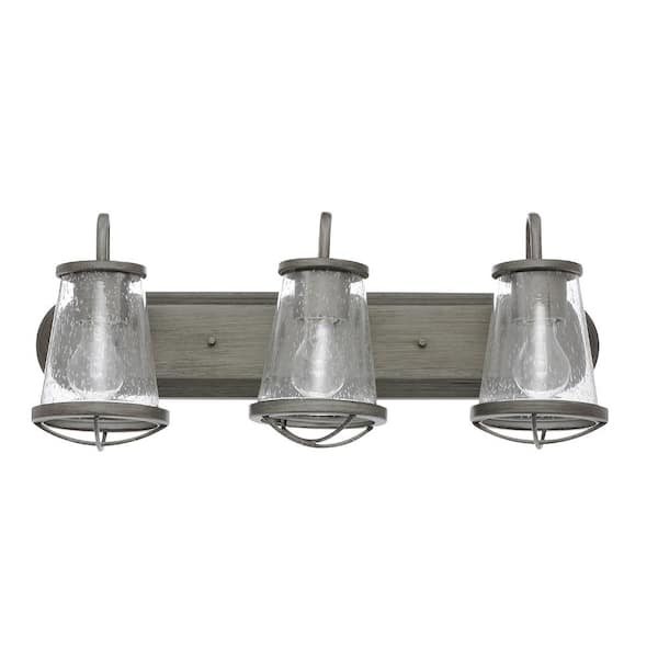 https://images.thdstatic.com/productImages/a99ee075-1f35-4483-9f72-f9b39b843ad4/svn/weathered-iron-home-decorators-collection-vanity-lighting-hb2626-322-64_600.jpg