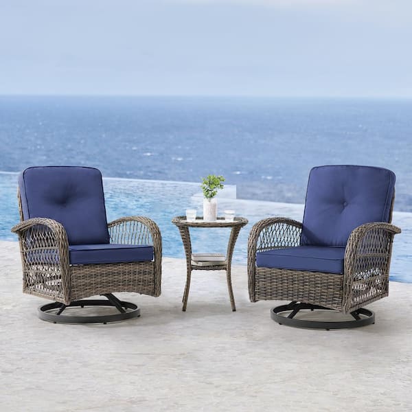 Kovach 3-Piece PE Wicker Patio Conversation Set with Navy Blue Cushion Rattan Swivel Rocking Chair and Side Table