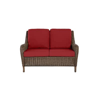 Cambridge Brown Wicker Outdoor Patio Loveseat with CushionGuard Chili Red Cushions