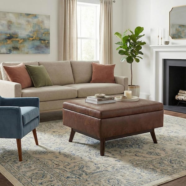 Simpli Home Owen 34 in. Faux Leather Wide Coffee Table Storage