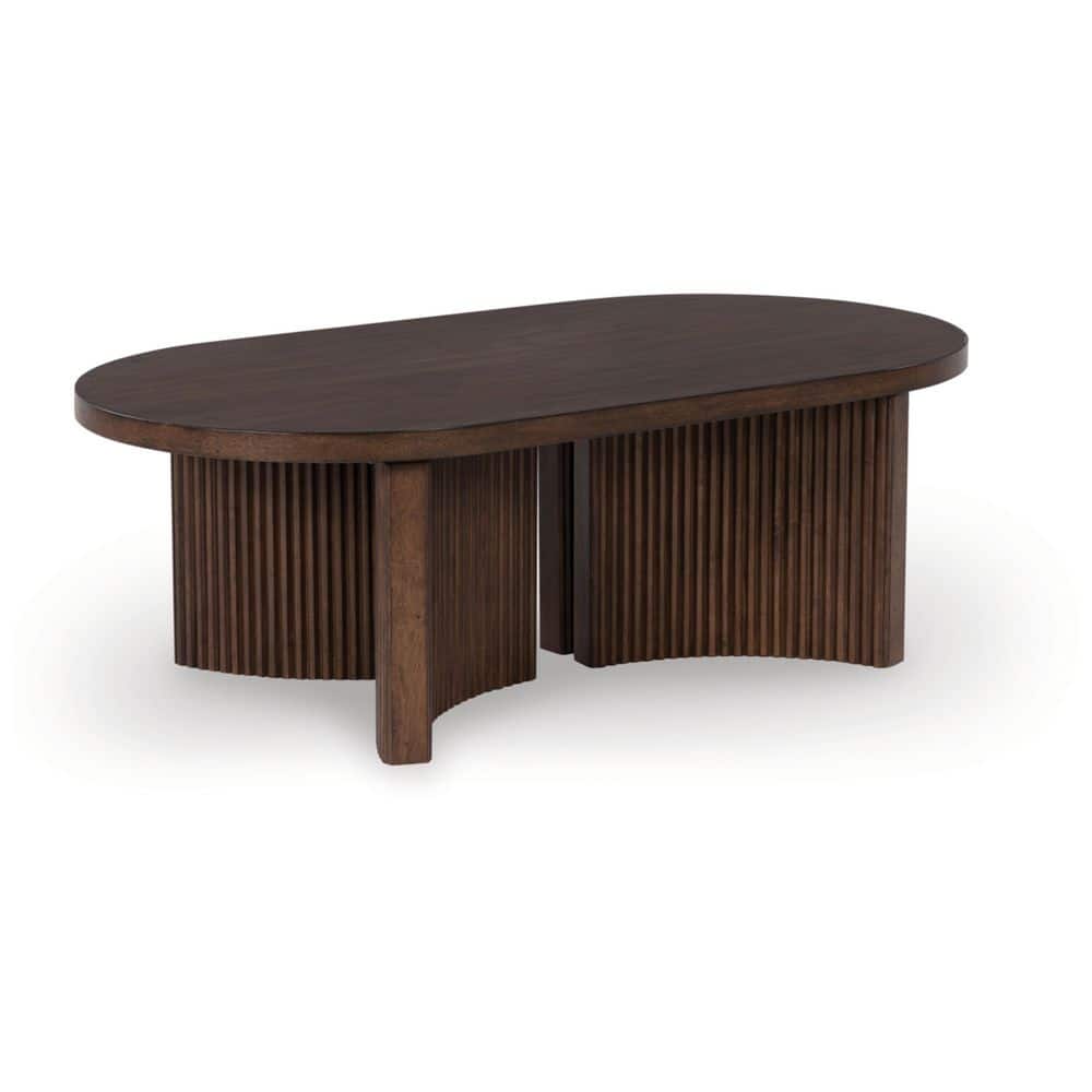 Signature DESIGN BY ASHLEY Korestone 52 in. Brown Oval Wood Coffee