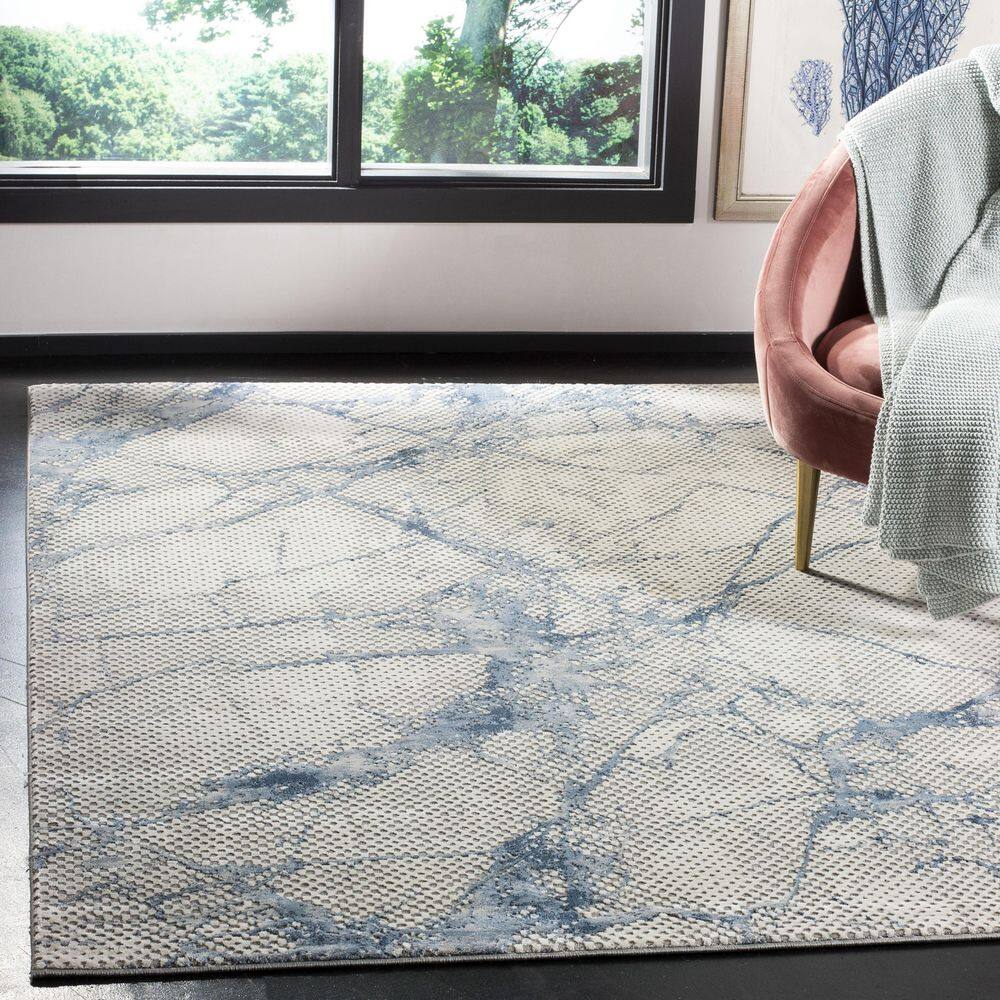 Ivory and Navy Abstract High Pile Area Rug 8' x 10'