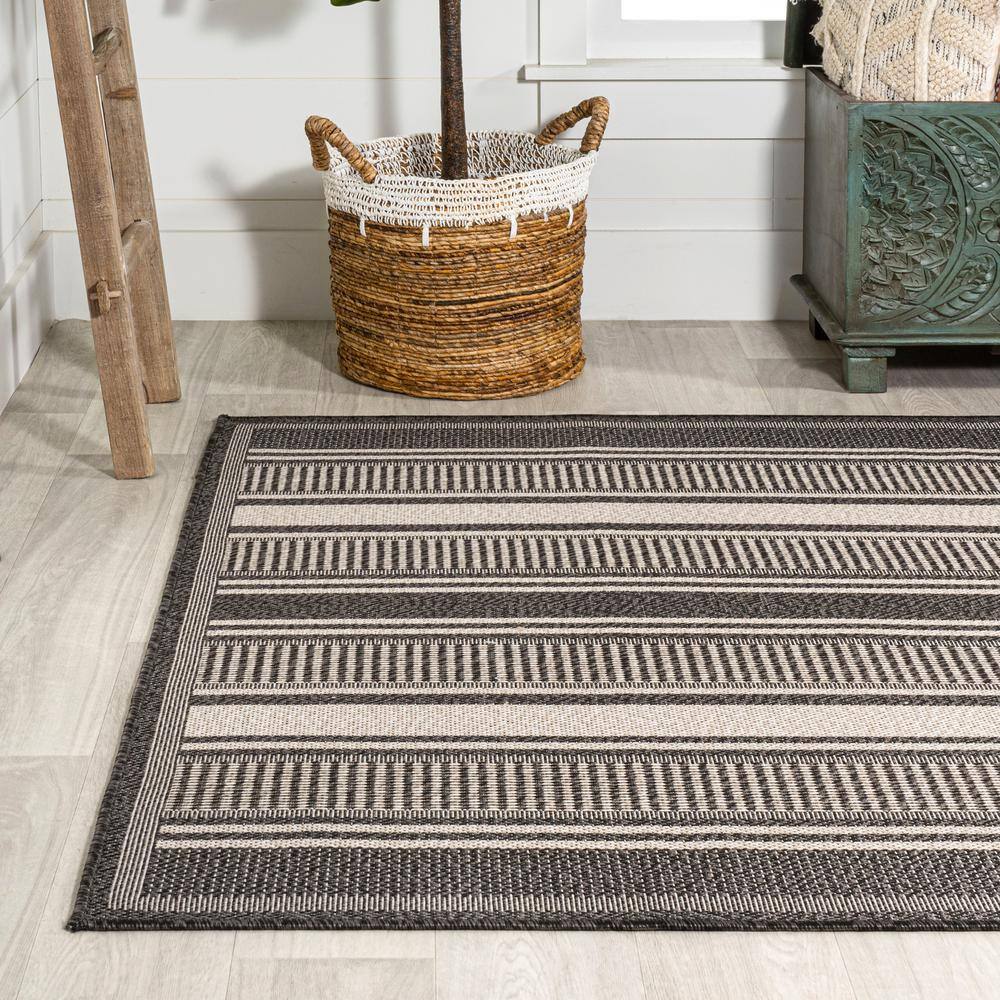 Haynes Minimalist Black and Cream Stripe 8' x 10' Synthetic Rug
