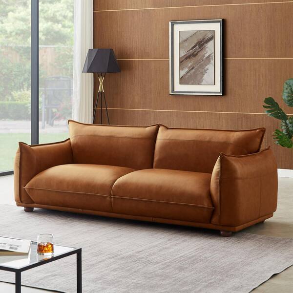 Leather sofa with online wood arms