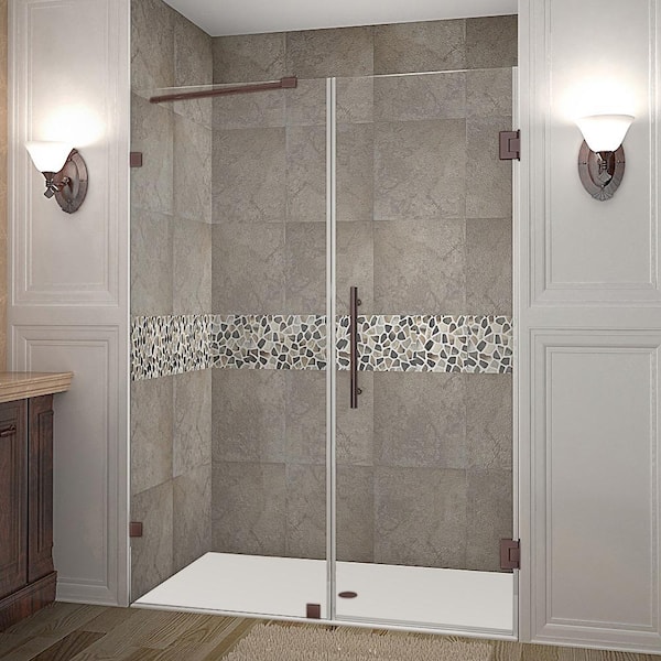 Aston Nautis 58.25 in. - 59.25 in. x 72 in. Frameless Hinged Shower Door in Bronze