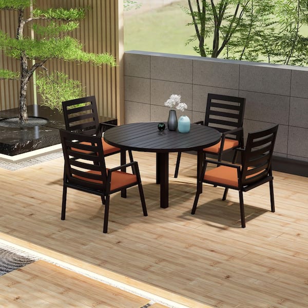 Leisuremod Chelsea 5-Piece Aluminum Outdoor Dining Set with 48 in. Round Table and 4 Dining Armchair w/ Cushions in Orange