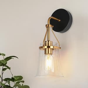 Modern 1-Light Black and Brass Wall Sconce with Bell Seeded Glass Shade