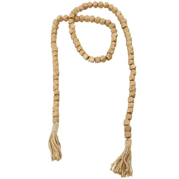Litton Lane Gold Handmade Mango Wood Hexagon Metallic Carved Geometric Long Beaded Garland with Tassel