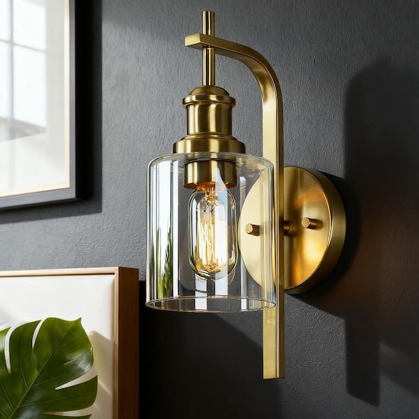 Alvra 1-Light Plated Natural Brass Hallway Bedroom Wall Sconce with Clear Glass Cylinder, Modern Vintage Vanity Light