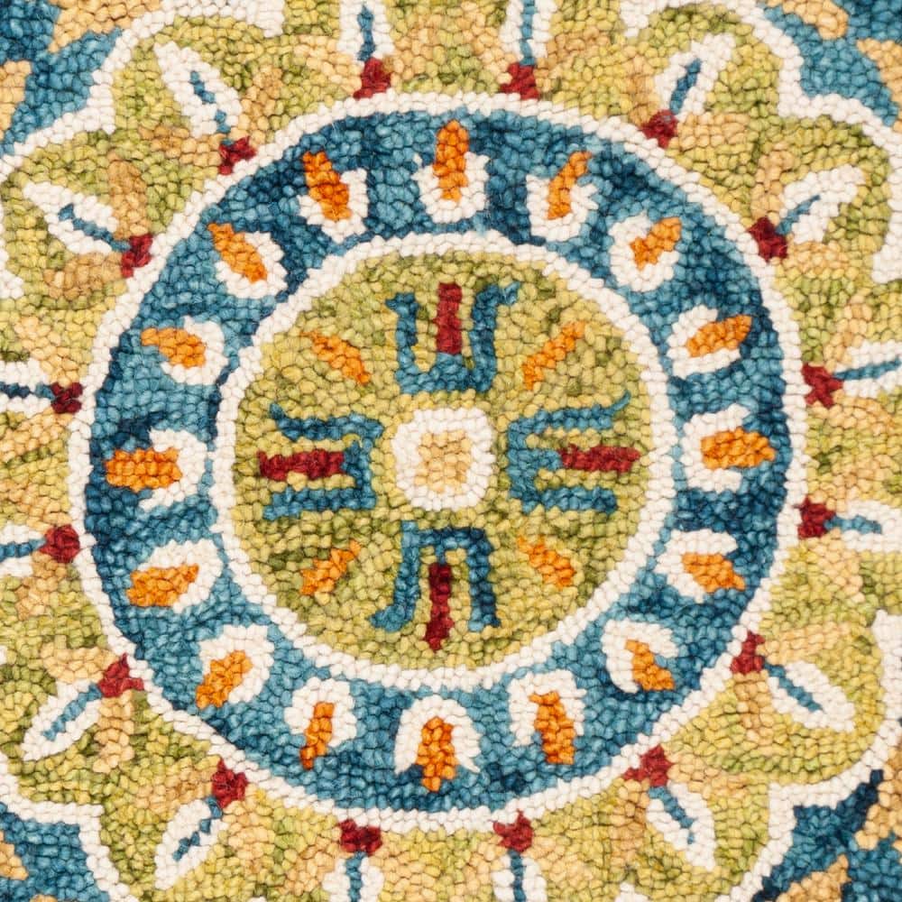 Handmade Tufted Round Blue and Ivory Floral Wool Rug