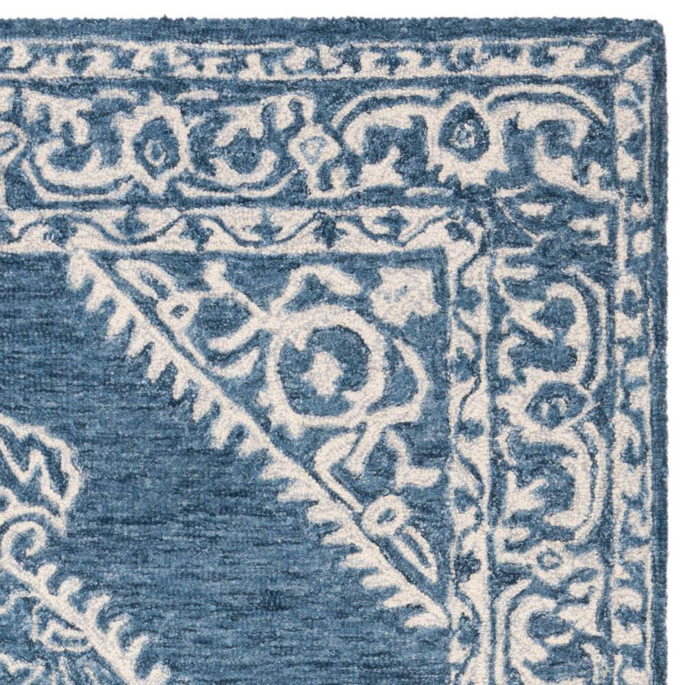 Blue and Ivory Tufted Wool 4' x 6' Area Rug