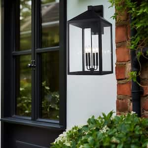 Storm 30 in. 4-Light Black Outdoor Wall Light Fixture with Clear Glass