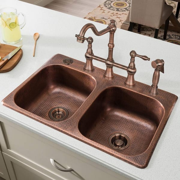 https://images.thdstatic.com/productImages/aa1832ae-611b-4f11-9097-a21eb1571e01/svn/antique-copper-akicon-garbage-disposal-parts-ak79001b-ac-4f_600.jpg