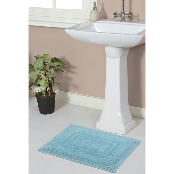 https://images.thdstatic.com/productImages/aa1f152f-4e54-4df8-b519-441567d2282b/svn/aqua-home-weavers-inc-bathroom-rugs-bath-mats-bop1724aq-64_600.jpg