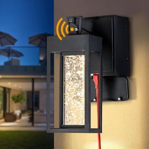 Modern LED Outdoor Matte Black Dusk to Dawn Sensor Wall Lantern Sconce with Seeded Glass and Built-in GFCI Outlets