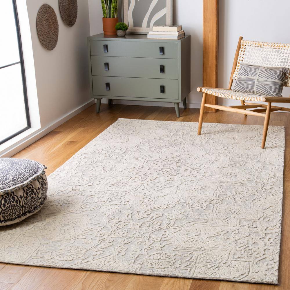 Handmade Ivory Abstract Wool Round Tufted Rug - 54" Diameter