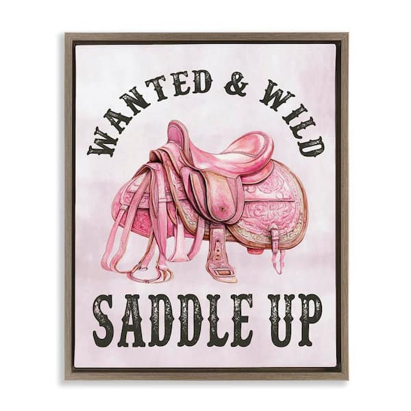 Stupell Industries Pink Saddle Up Cowgirl by Lettered and Lined Brown Floater Frame Typography Graphic Art Print 31 in. x 25 in.