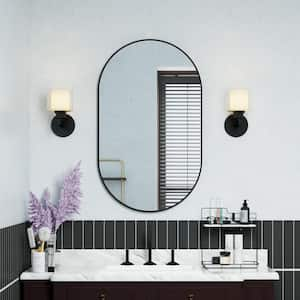 24 in. W x 40 in. H Oval Framed Wall Mount Bathroom Vanity Mirror in Matte Black