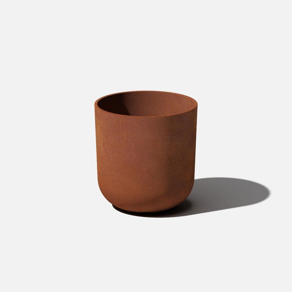 Patina Kona Medium Rust Plastic Round Planter with Drainage Holes (10 in. L x 10 in. W x 10.25 in. H) price history on PriceWatchPro