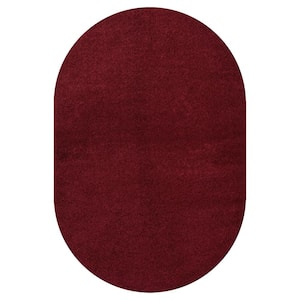 Haze Solid Low-Pile Dark Red 6 ft. x 9 ft. Oval Area Rug