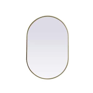 Simply Living 24 in. W x 36 in. H Oval Metal Framed Brass Mirror
