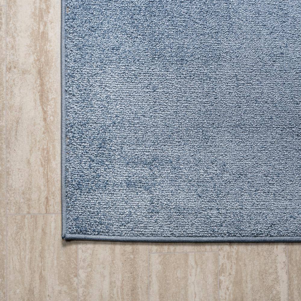 Classic Blue Oval 4' x 6' Synthetic Area Rug