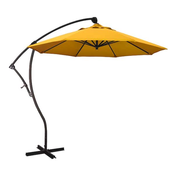 California Umbrella 9 ft. Bronze Aluminum Cantilever Patio Umbrella with Crank Open 360 Rotation in Yellow Pacifica